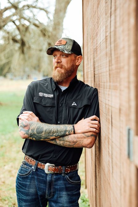 Kix Nelson standing on a Missouri hunting property at dusk