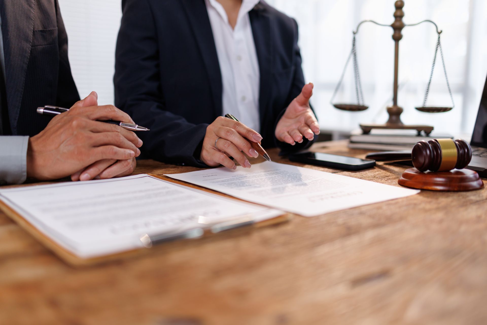 Estate Law Firm attorney reviewing intestate succession documents.