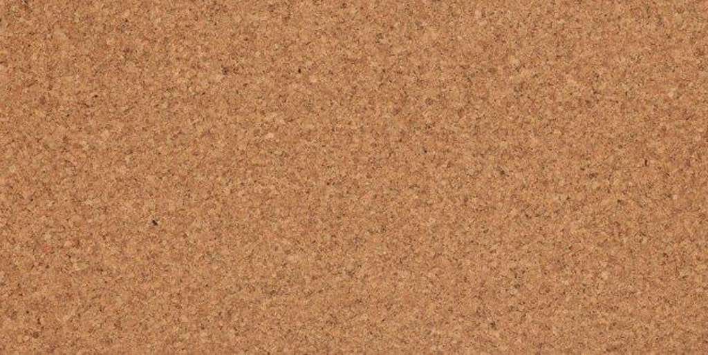 A close up of a cork board texture.