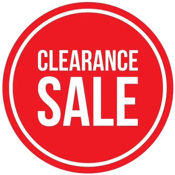 A red sign that says clearance sale in white letters