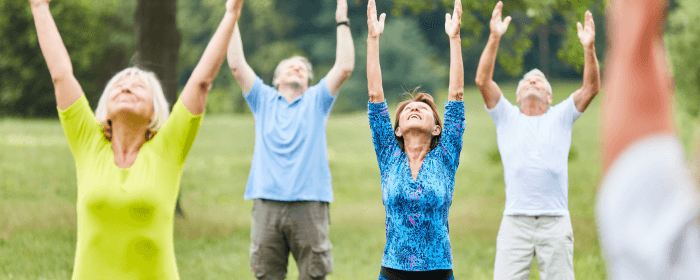 A vibrant image showcasing people enjoying a healthy activity outdoors in a beautiful UK setting.
