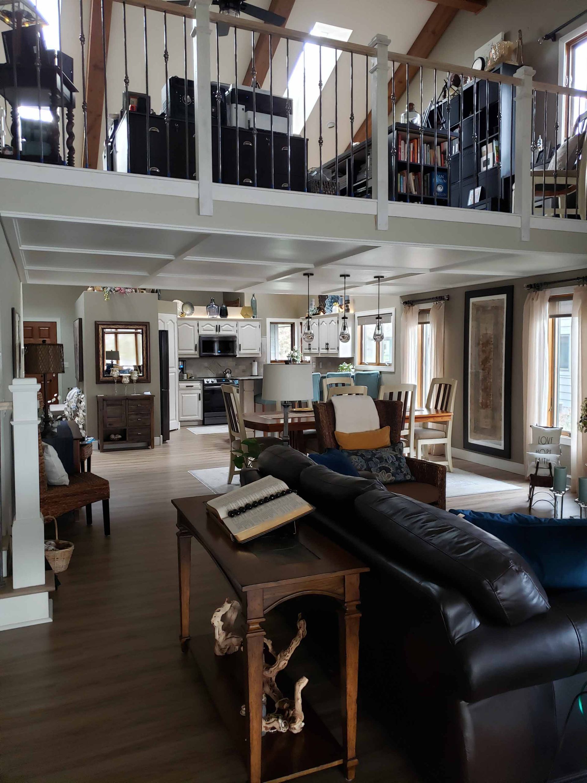 A living room with a couch and a table in it