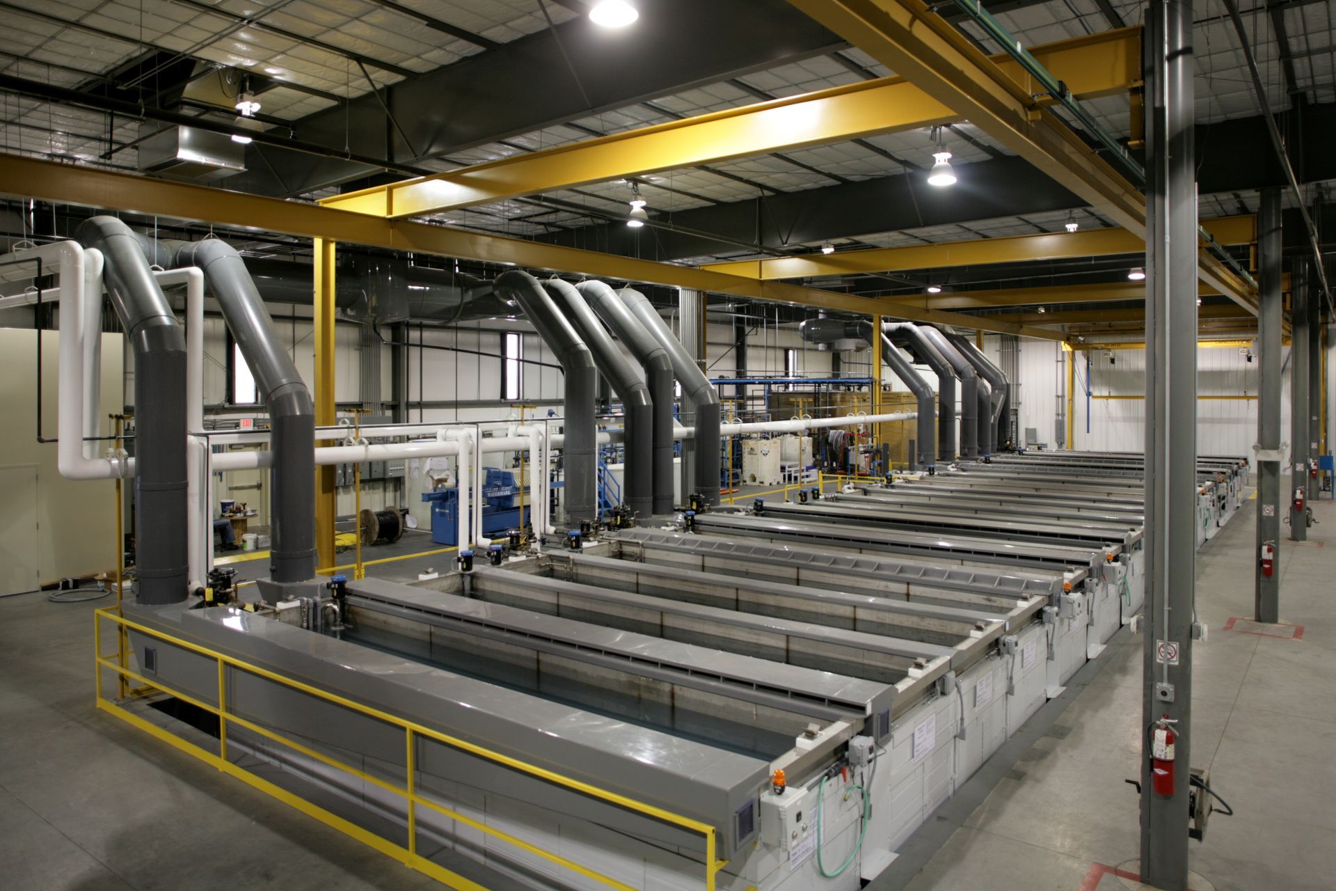 A large factory with a lot of machinery and pipes