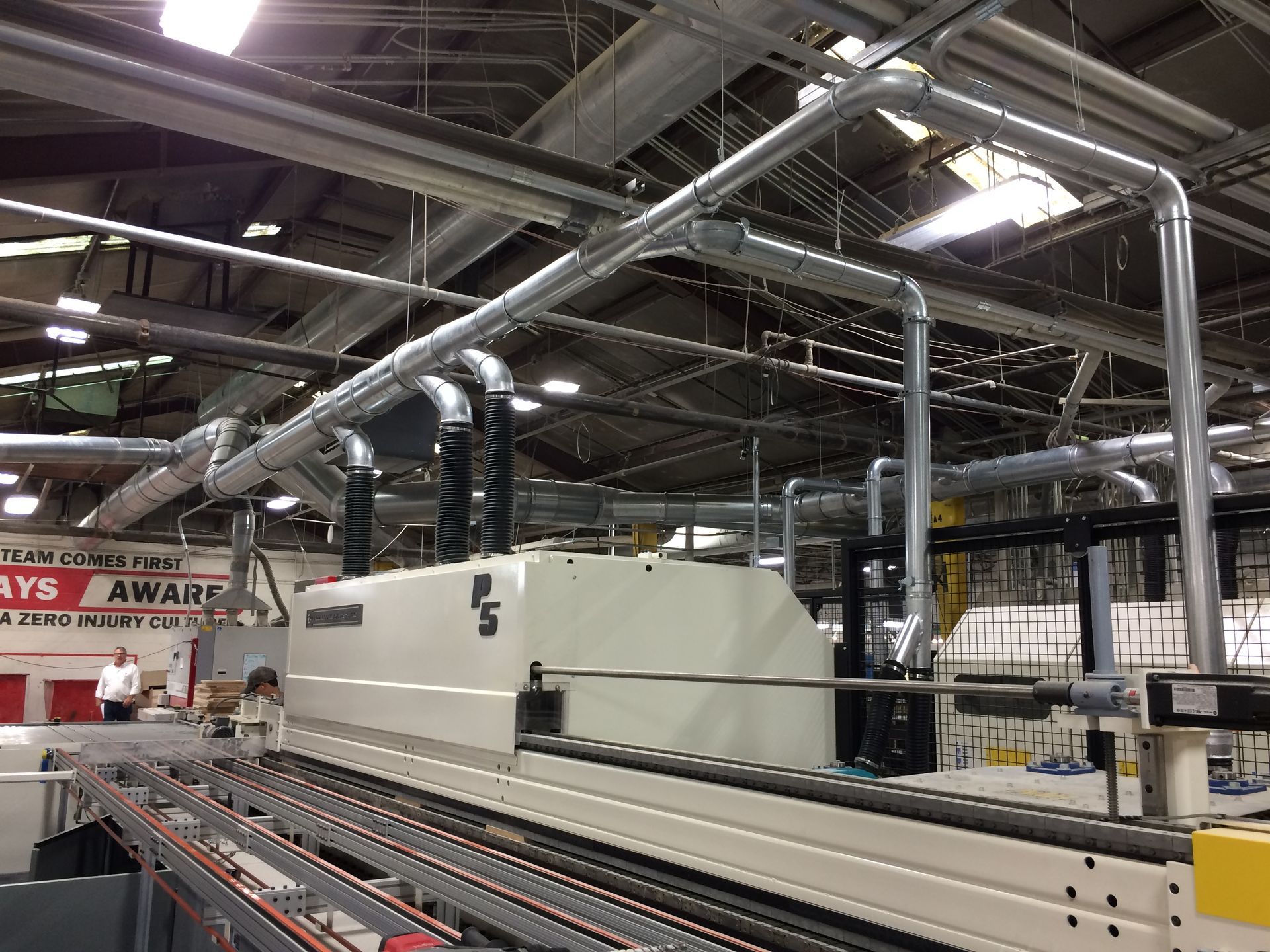 A factory with a sign that says aware on it