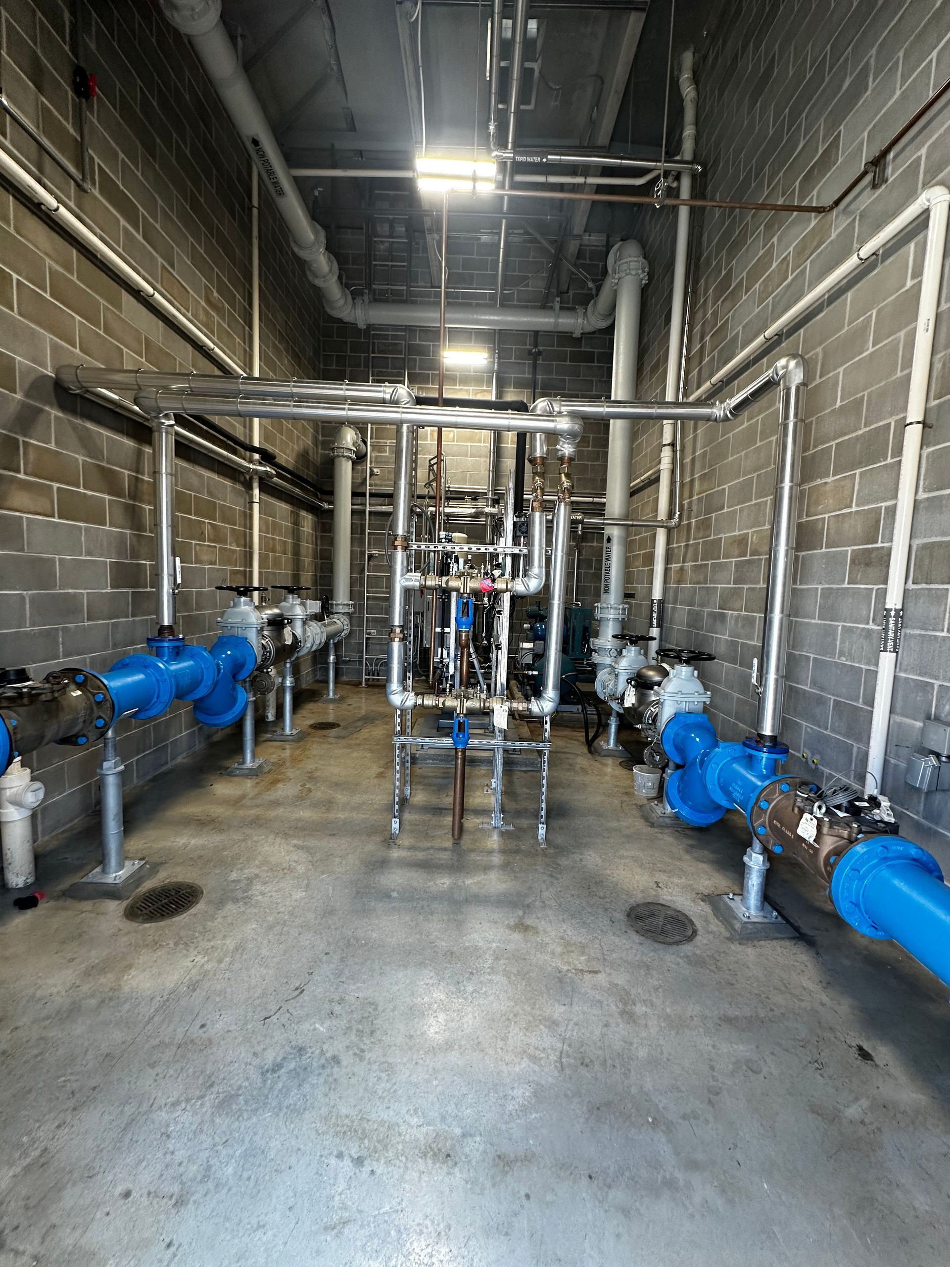 A room filled with lots of pipes and valves.