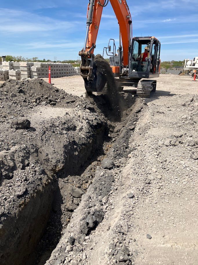 Heavy equipment performing site excavation for Central's mechanical construction project