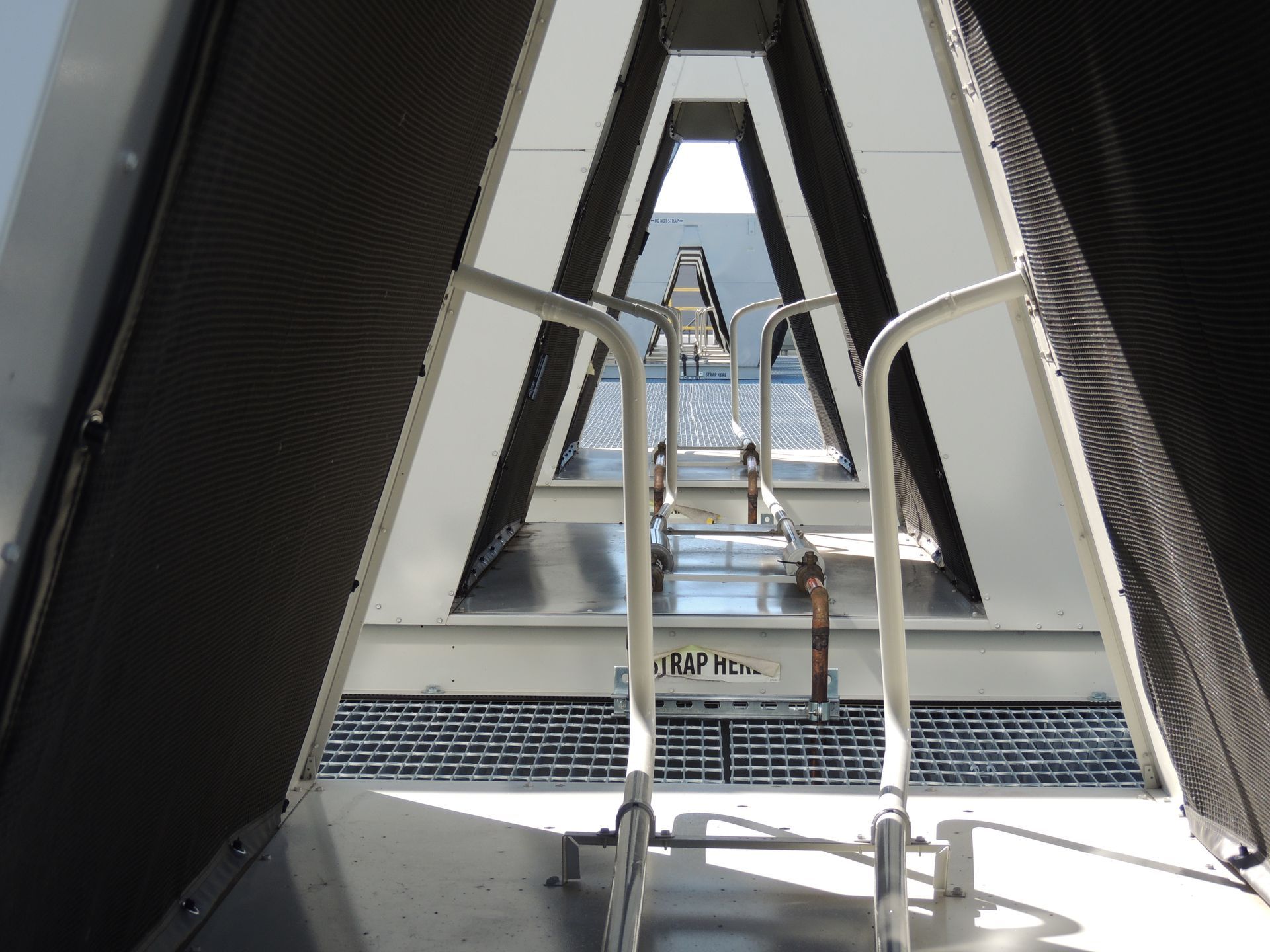 A staircase leading up to a building with the letter a on it