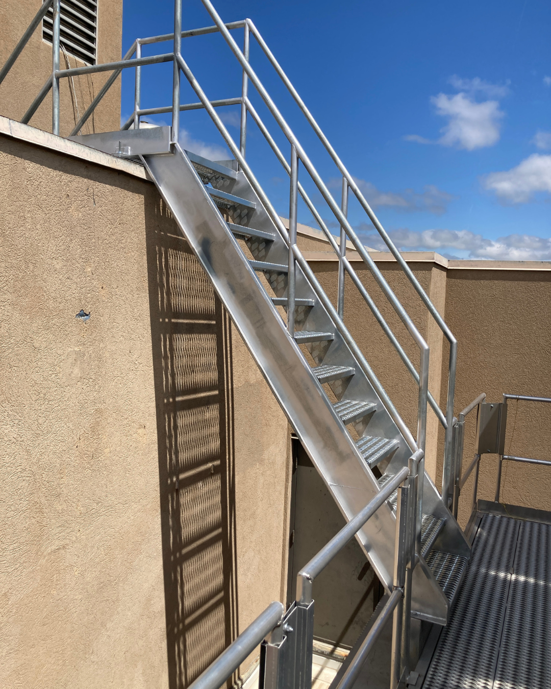 Image of custom built access stairs at a client facility.