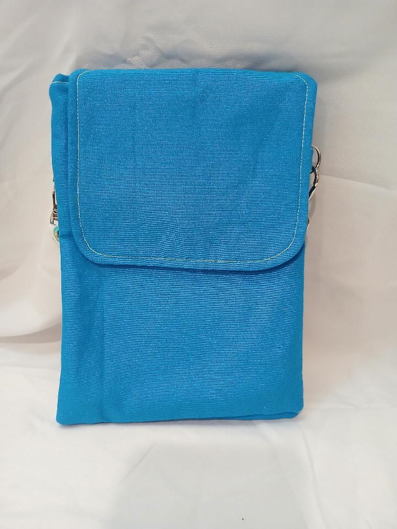 Blue zippered pouch with a flap closure on a plain white background