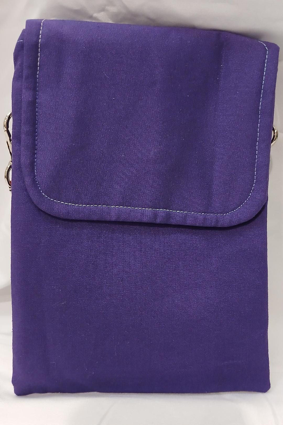 Purple fabric pouch with flap closure on a white background