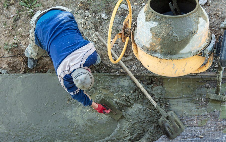 worker holding the trowel