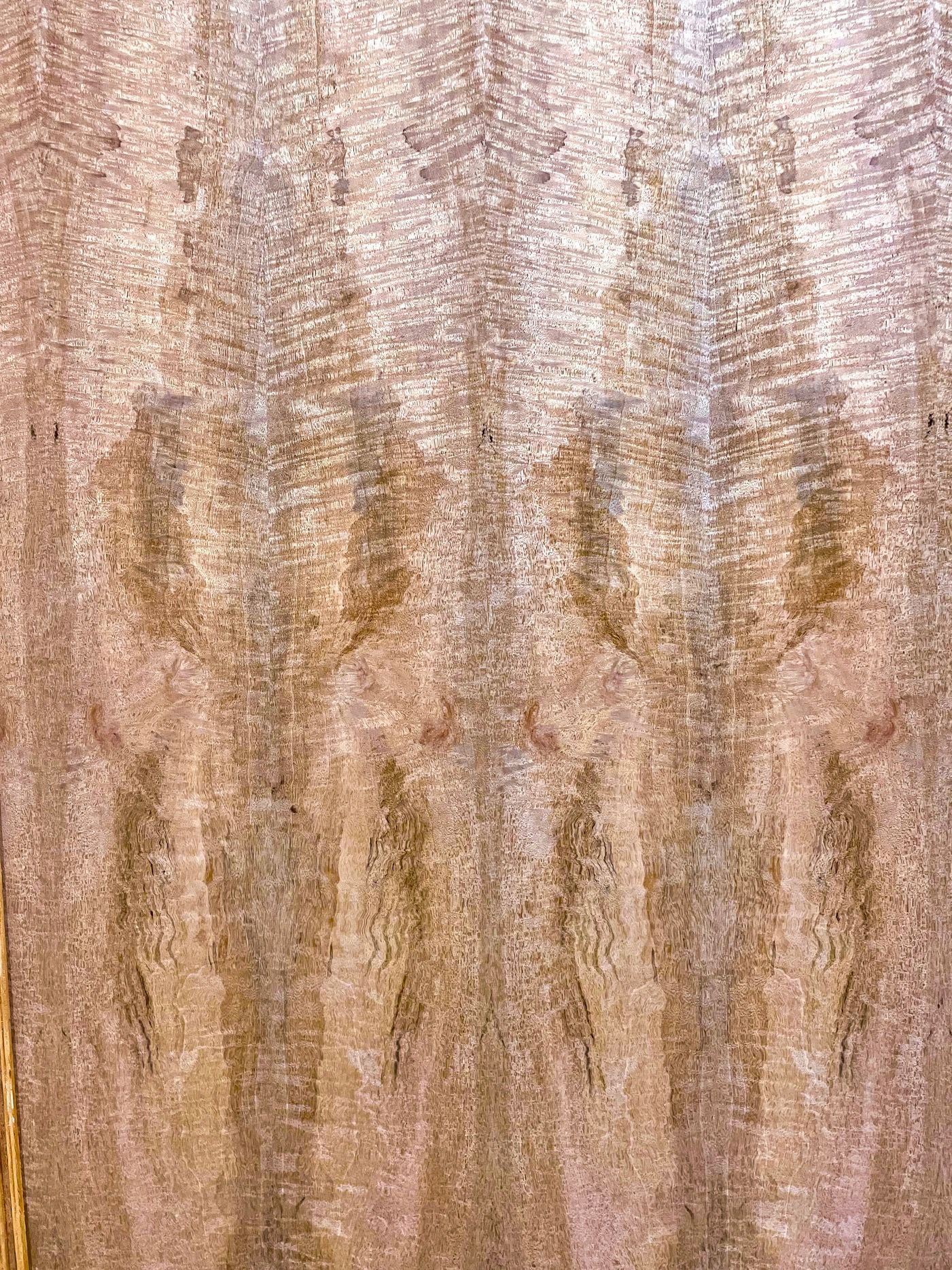 A close up of a piece of wood with a pattern on it.