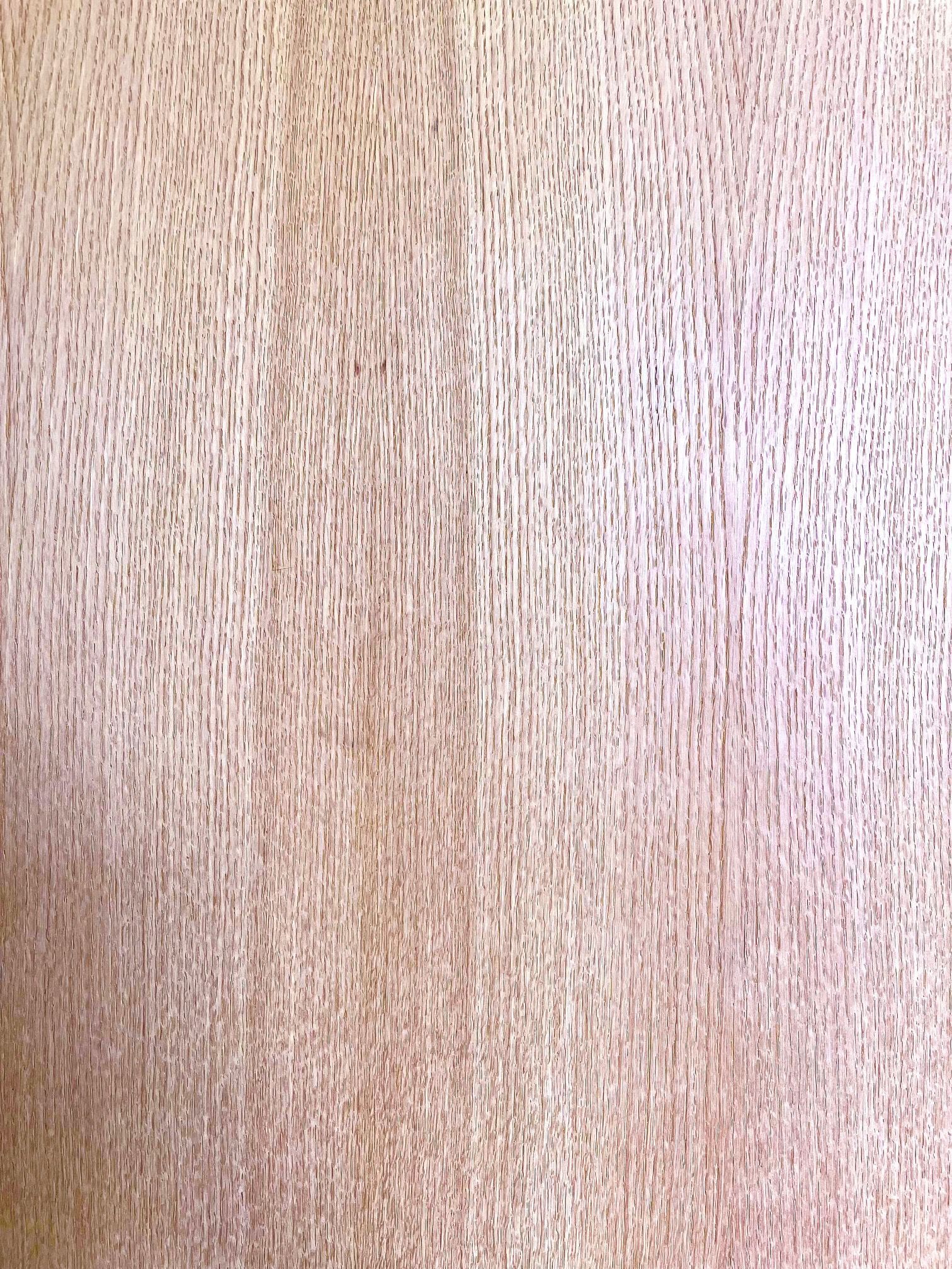 A close up of a piece of wood showing the grain and texture.