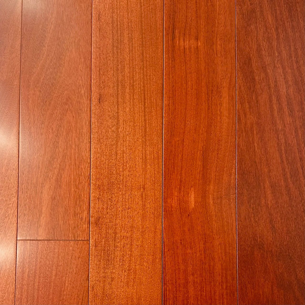 A close up of a wooden floor with a lot of grain.