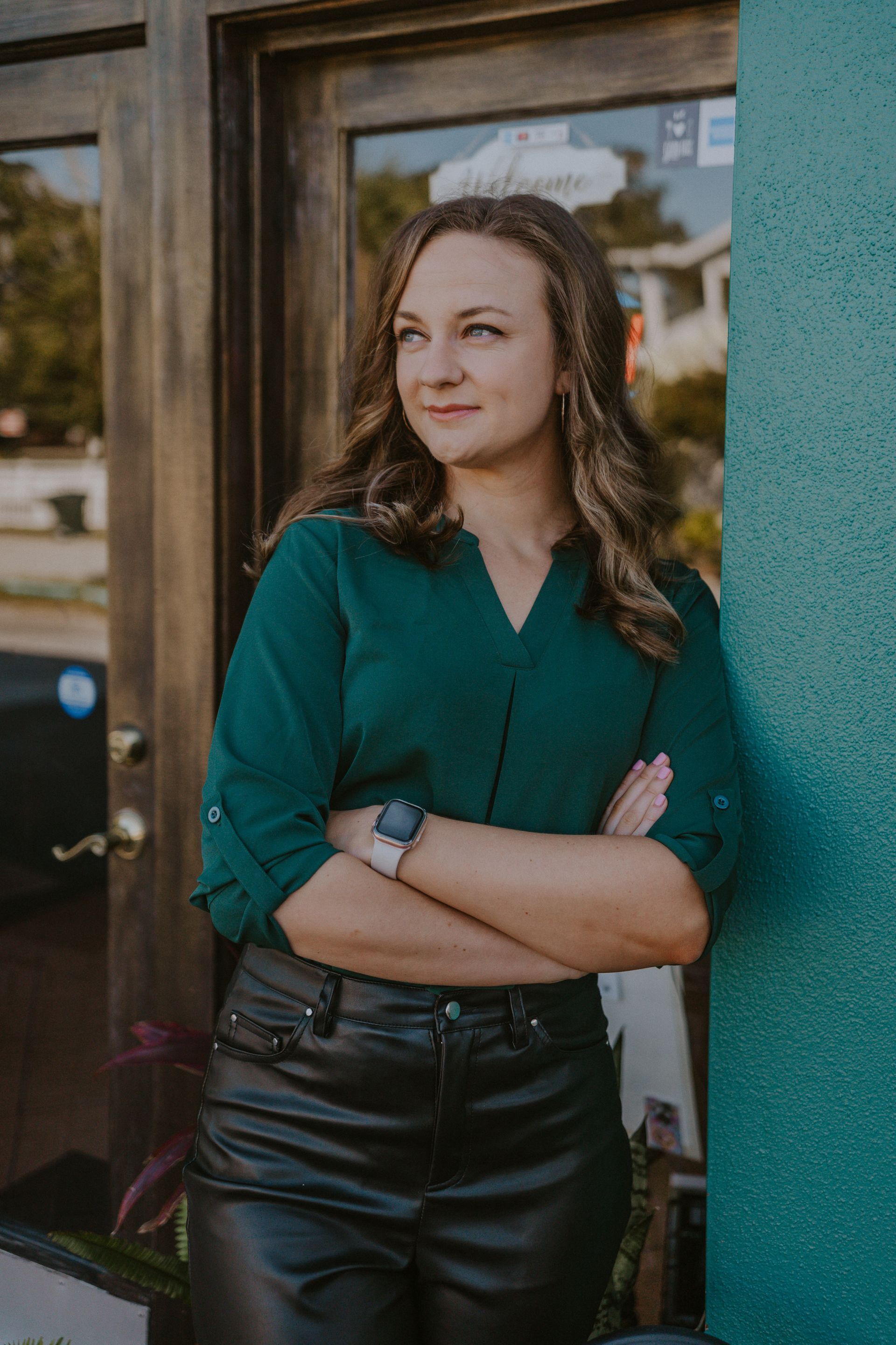 Lauren Bauer leaning against wall