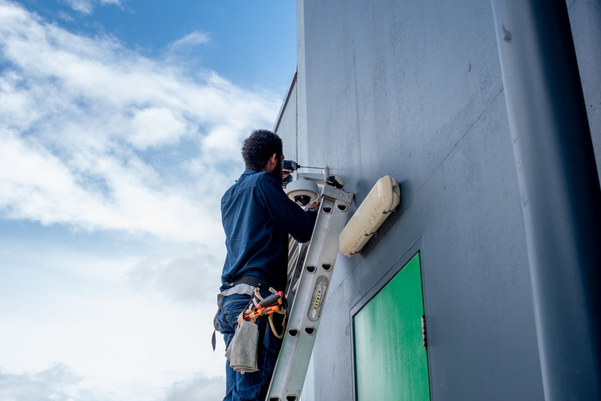 White Refrigerated Room Door With Security Camera — NQ Video Surveillance in Mission Beach, QLD