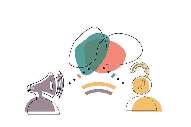 Um desenho que representa a comunicação não violenta com um megafone e uma orelha