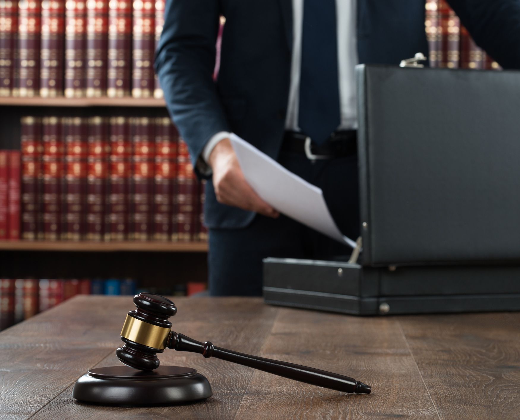 Lawyer Putting Document in Briefcase — Hendersonville, TN — Frizzell & Frizzell, PLLC
