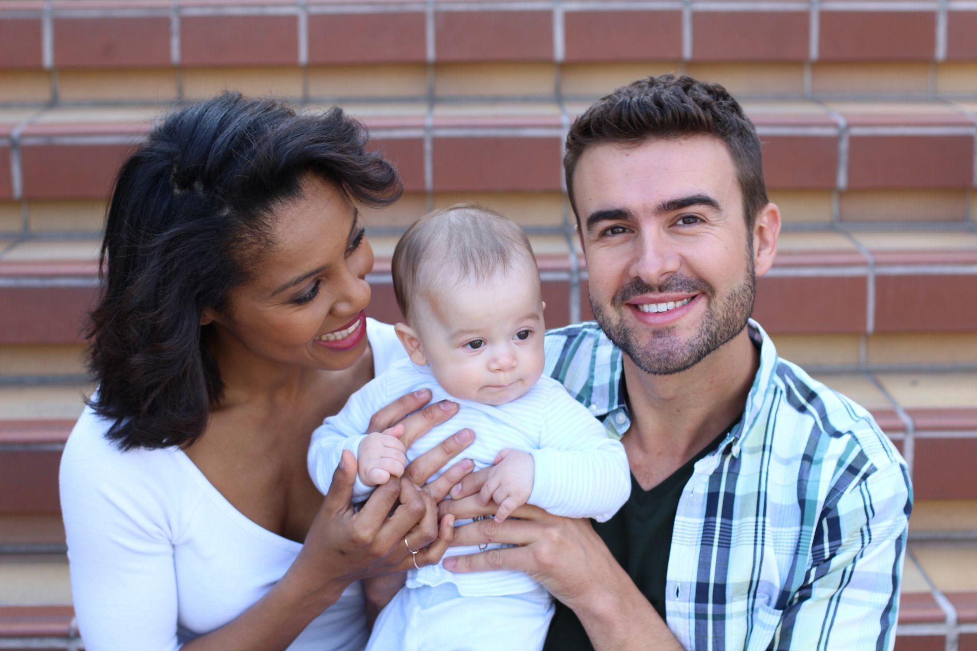 Couple and Their Baby — Hendersonville, TN — Frizzell & Frizzell, PLLC