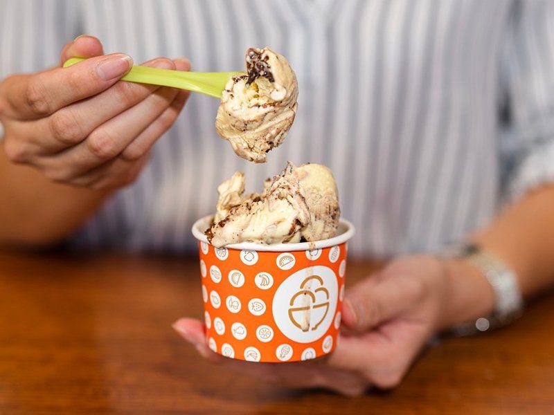 Person Eating Cup of Gelato — Quench Juice Bar in Fortitude Valley, QLD