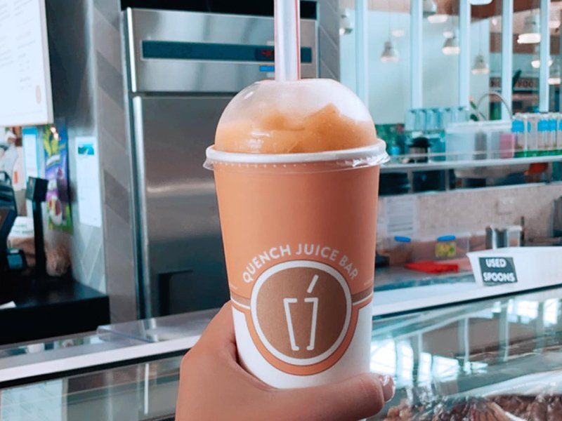 Person Holding a Smoothie — Quench Juice Bar in Fortitude Valley, QLD