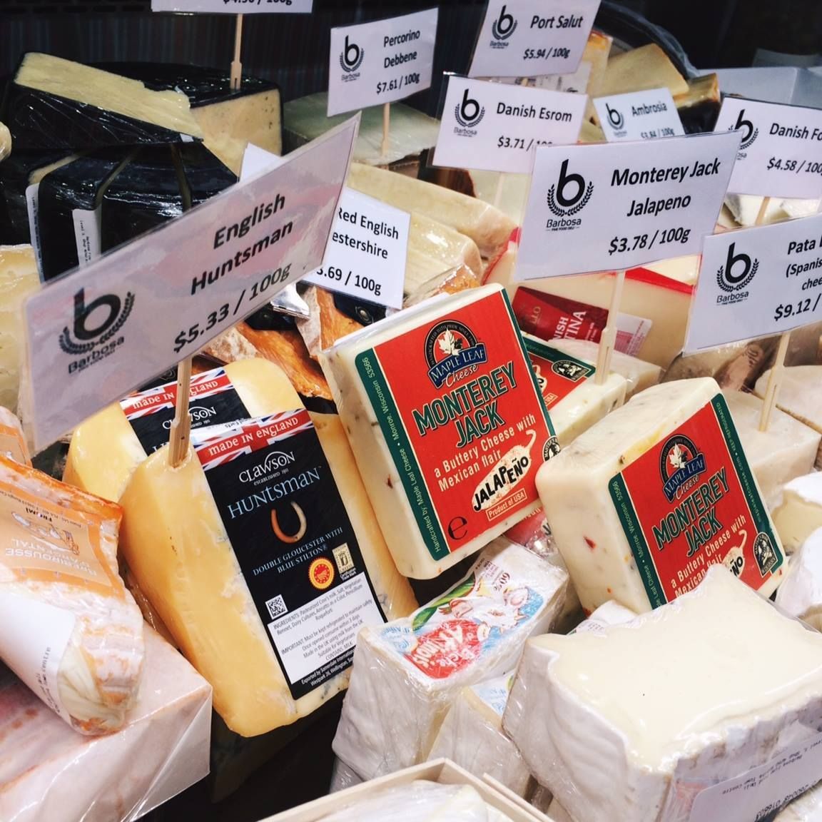 A Variety of Cheeses are Displayed in a Store — Barbosa Fine Food Deli in Robina, QLD