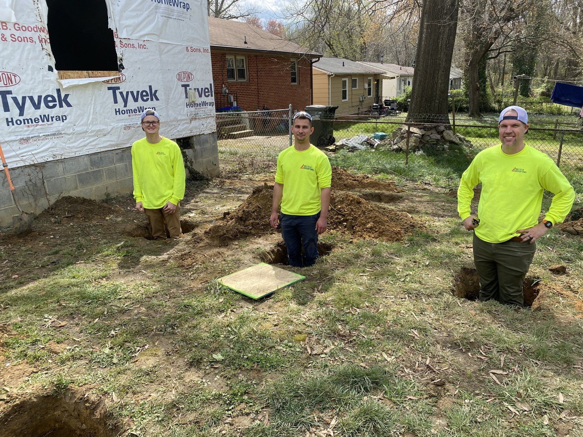 Image of RETEX's Caleb Hennon, Caleb Kammerling, and Mark Erickson volunteering for Richmond Habitat for Humanity.