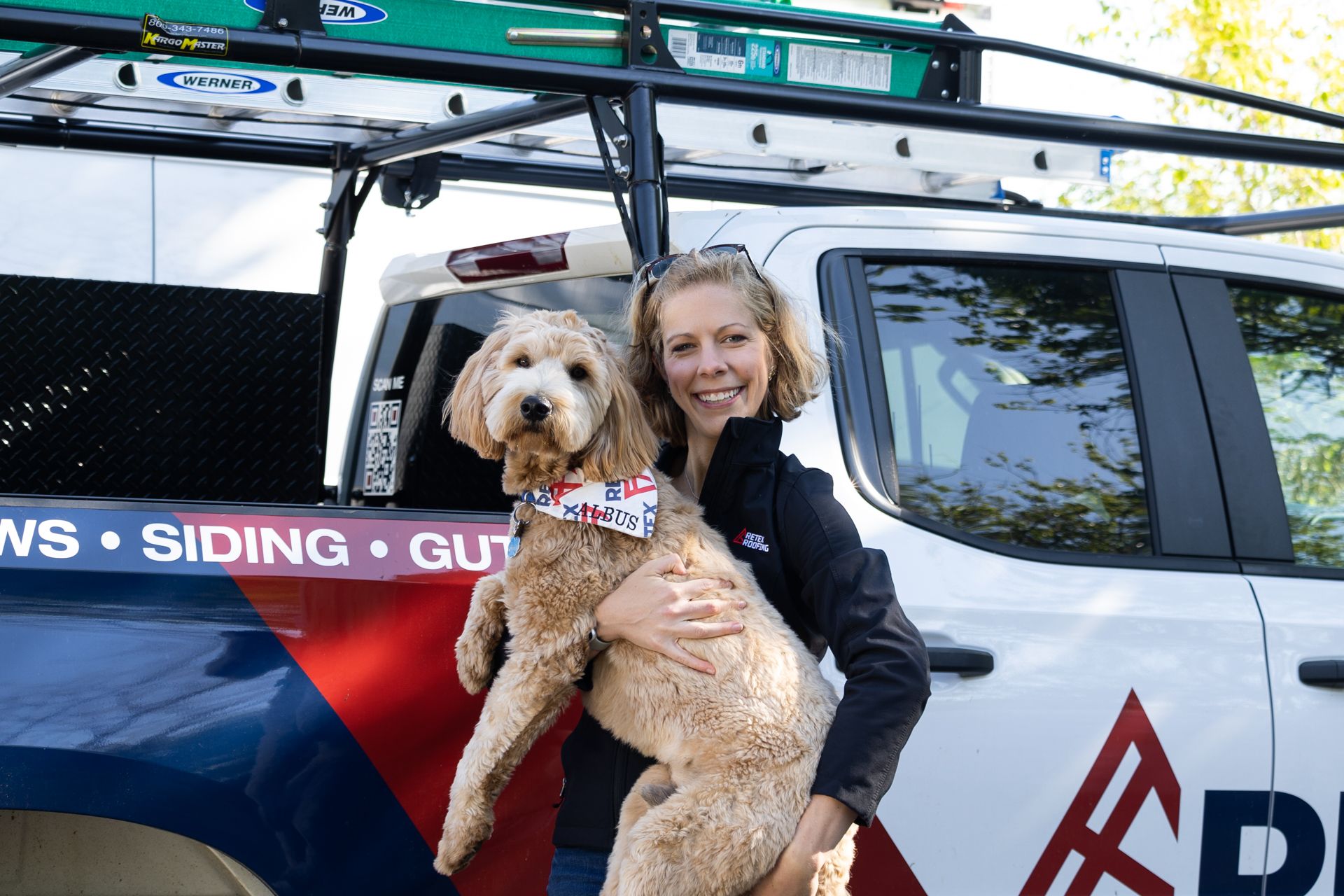 Portrait image of RETEX's Albus and Katelyn Lewis in front of Retex truck.
