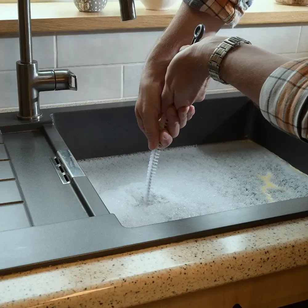 cleaning kitchen sink drain