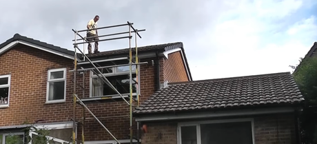 Man working on roof