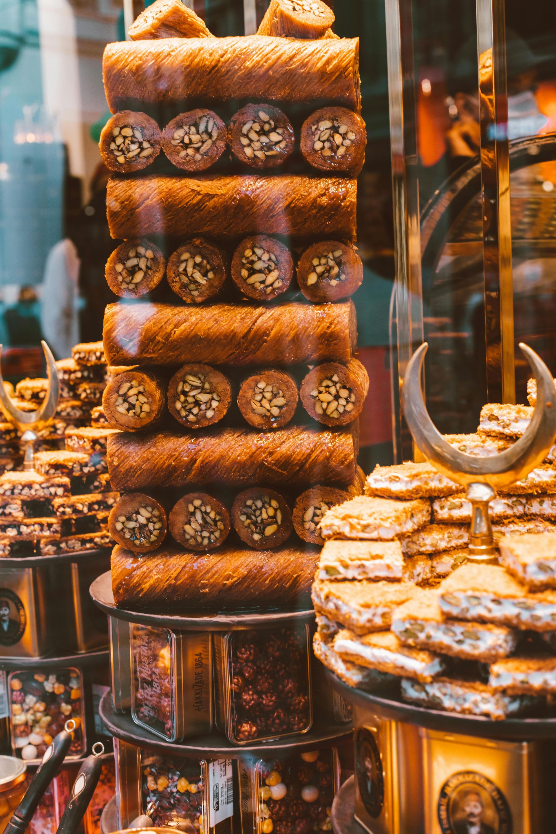 A stack of cookies sitting on top of each other in a store window.