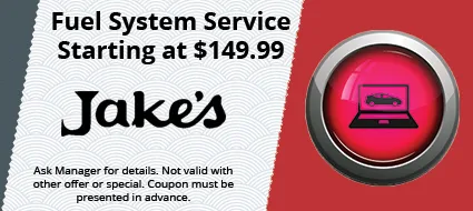 Transmission fluid exchange service coupon starting at $189.99 for Jake's. Features an orange button with gears.