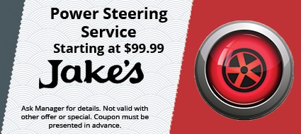 A red button with a wheel on it that says power steering service starting at $ 99.99 at jake 's.