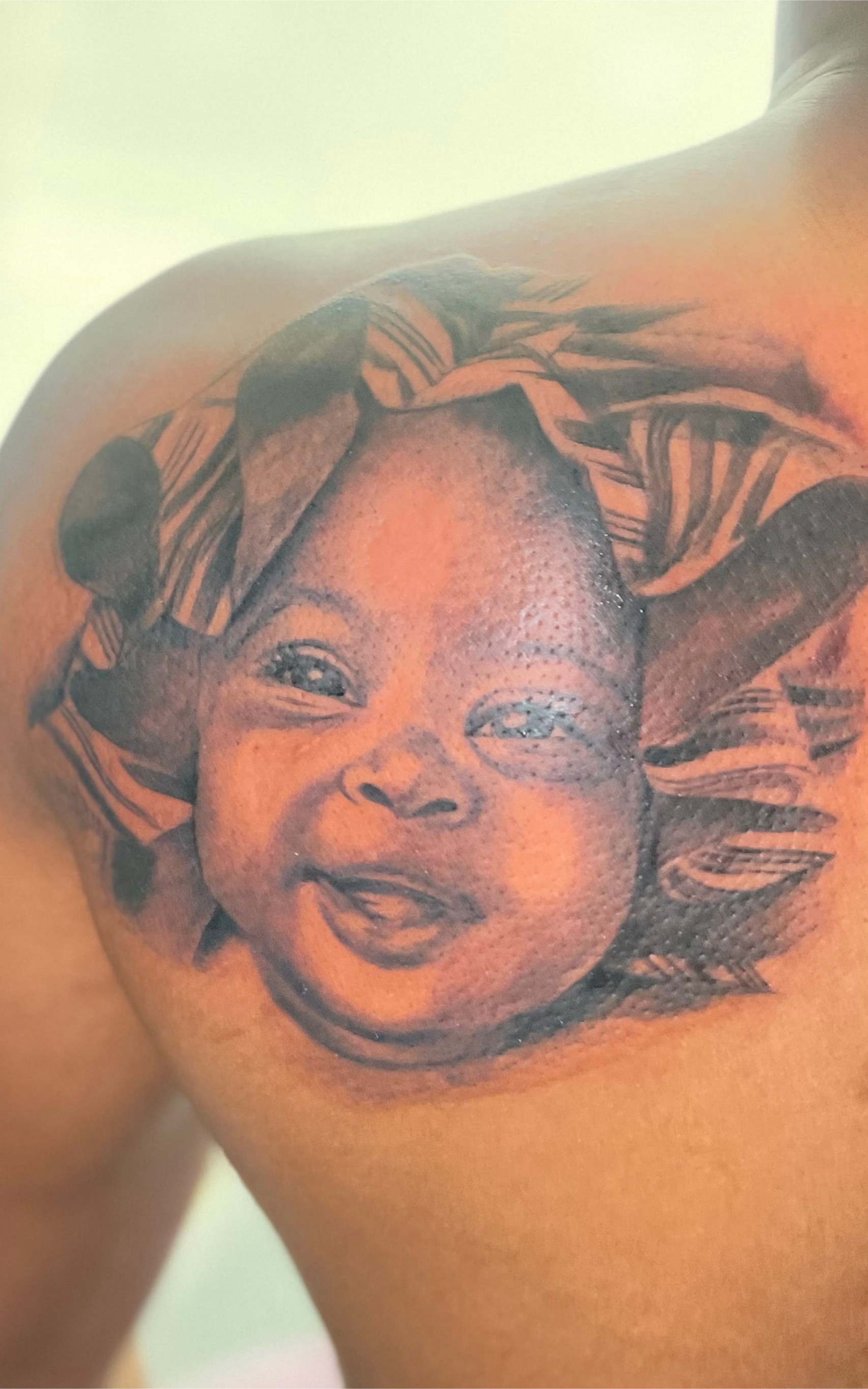 Charlotte NC tattoo artist, portrait tattoos Charlotte NC, tattoos on melanated skin, black and grey realism tattoo,