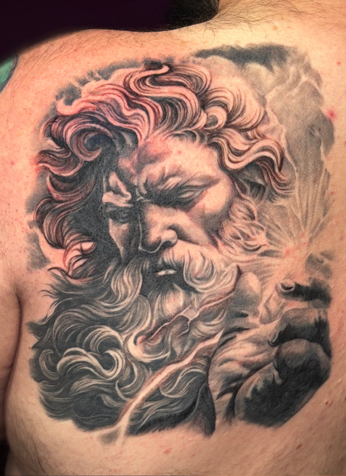 Charlotte NC tattoo artist, custom tattoos Charlotte NC, tattoo on melanated skin, black and grey realism tattoo, Zeus tattoo