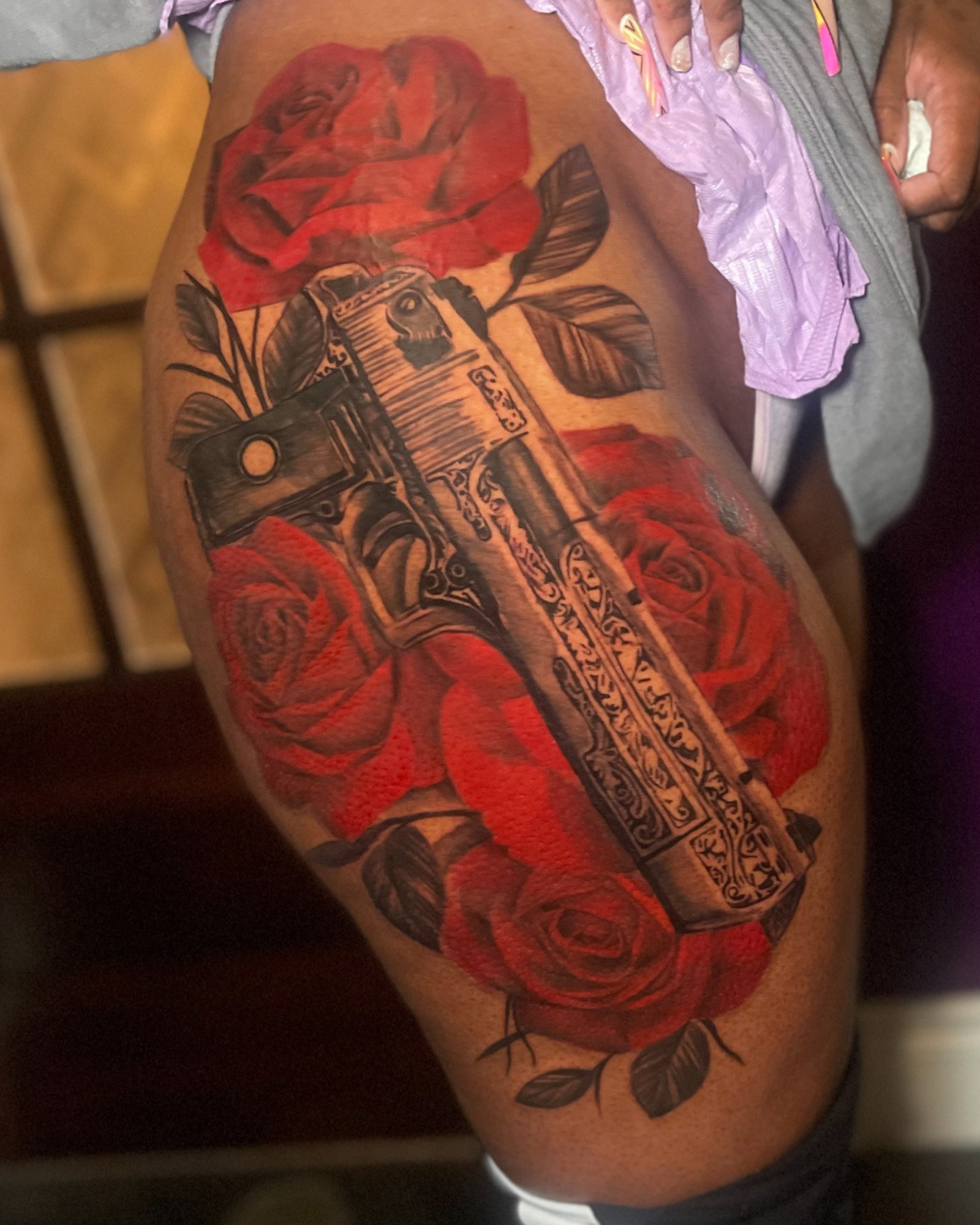 Charlotte NC tattoo artist, rose tattoos Charlotte NC, tattoos on melanated skin, black and grey realism tattoo,