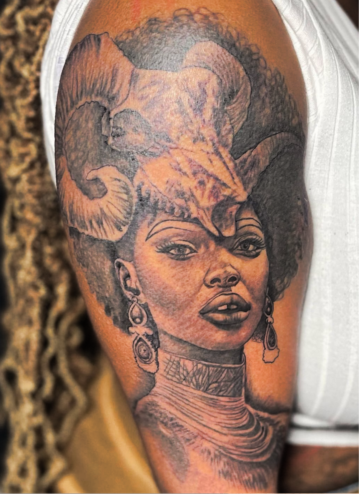 Charlotte NC tattoo artist, tattoos on melanated skin, black and grey realism tattoo, Aries goddess tattoo