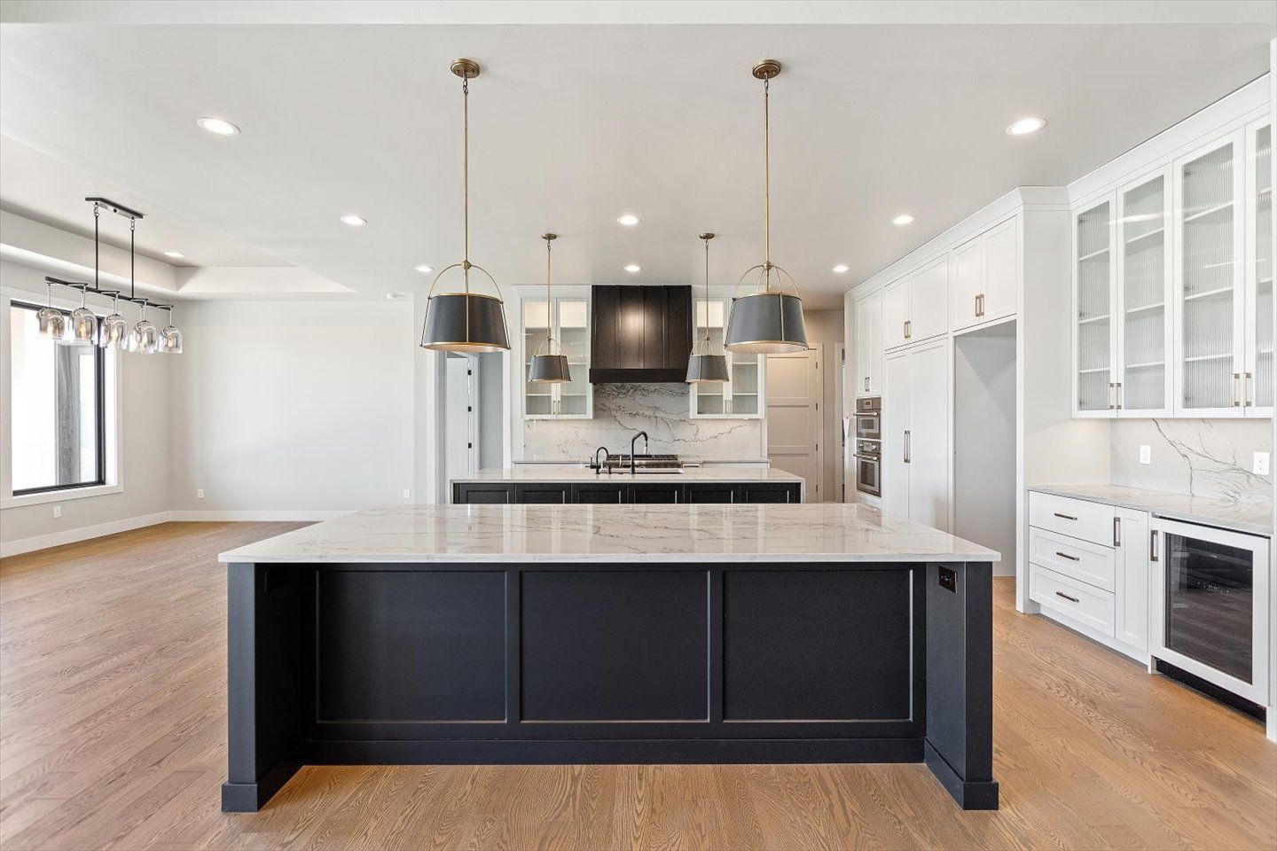 There is a large island in the middle of the kitchen.