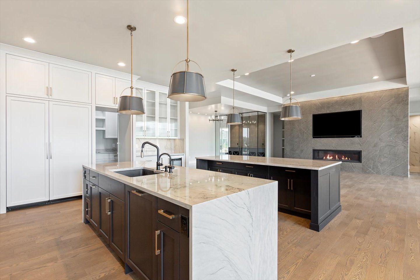 There is a large island in the middle of the kitchen.