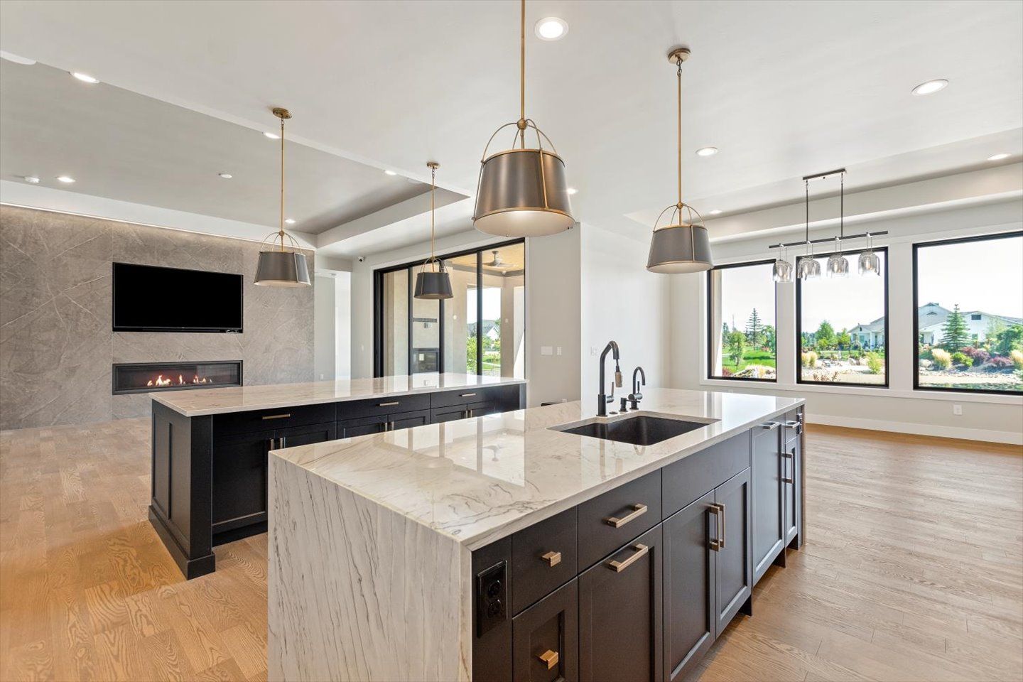 There is a large island in the middle of the kitchen.