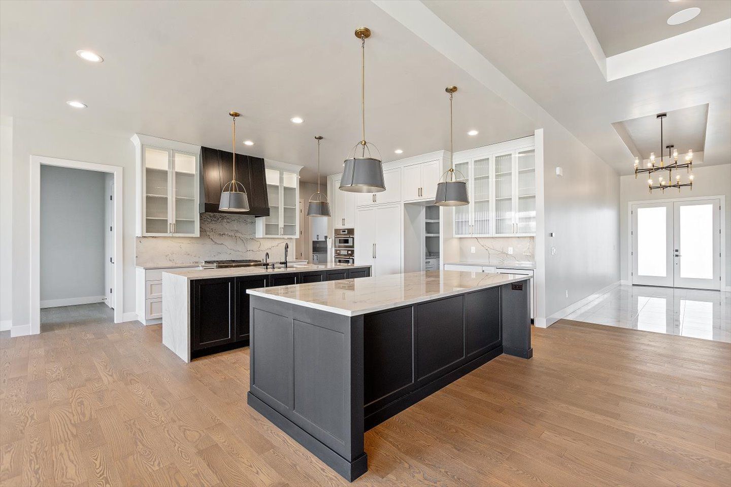 There is a large island in the middle of the kitchen.