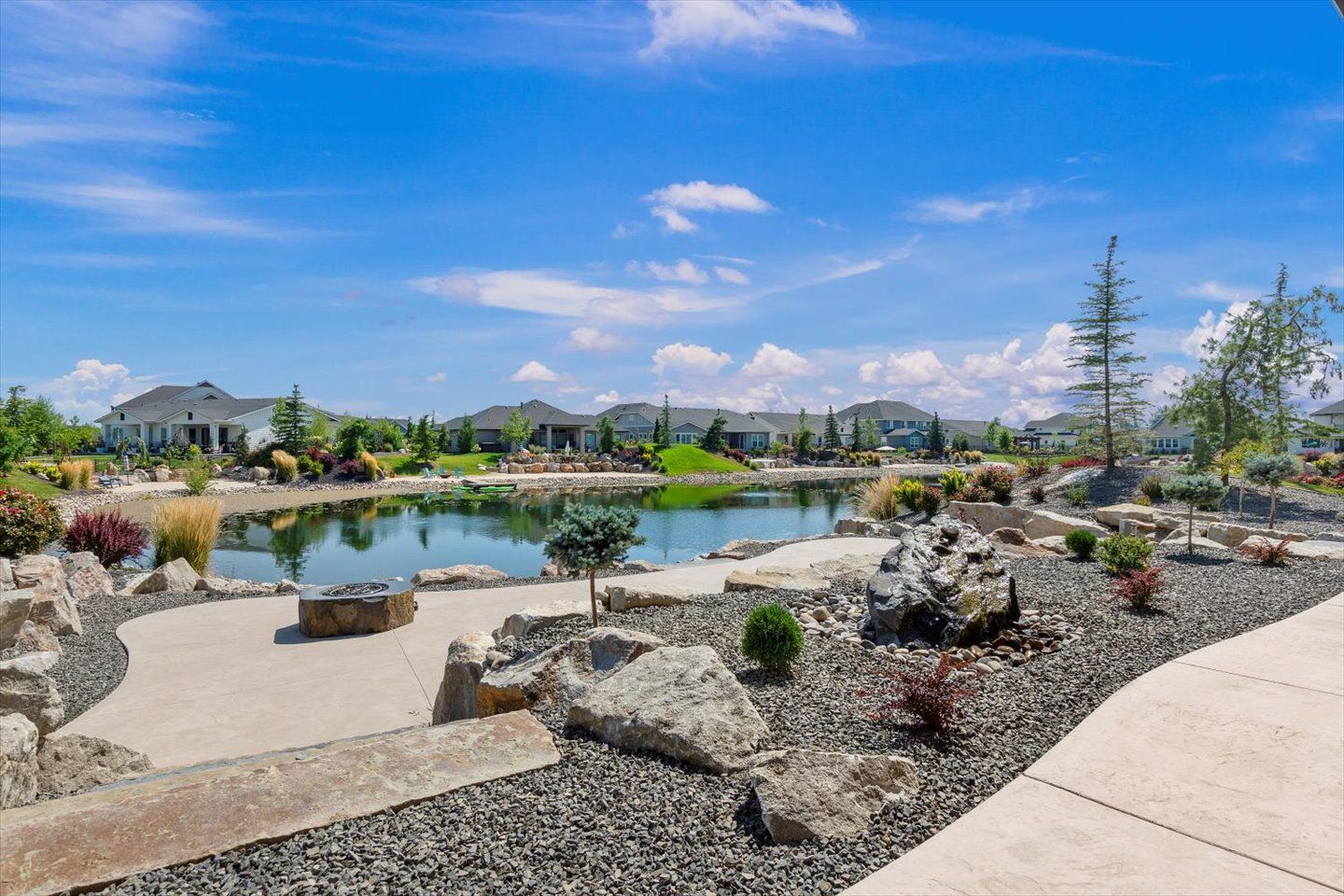 There is a large pond in the middle of the park.