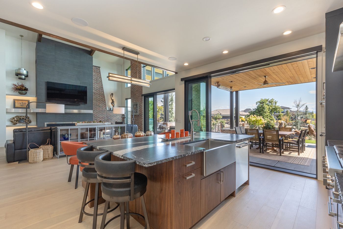 There is a large island in the middle of the kitchen.