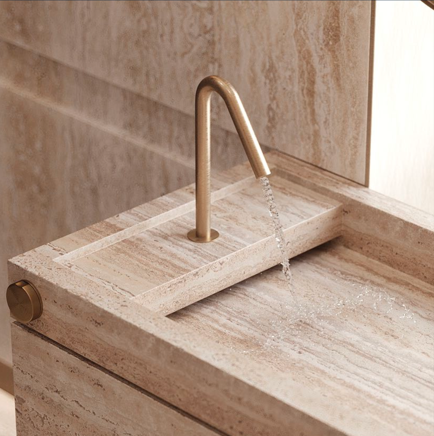 A bathroom sink with a brass faucet and a marble counter top