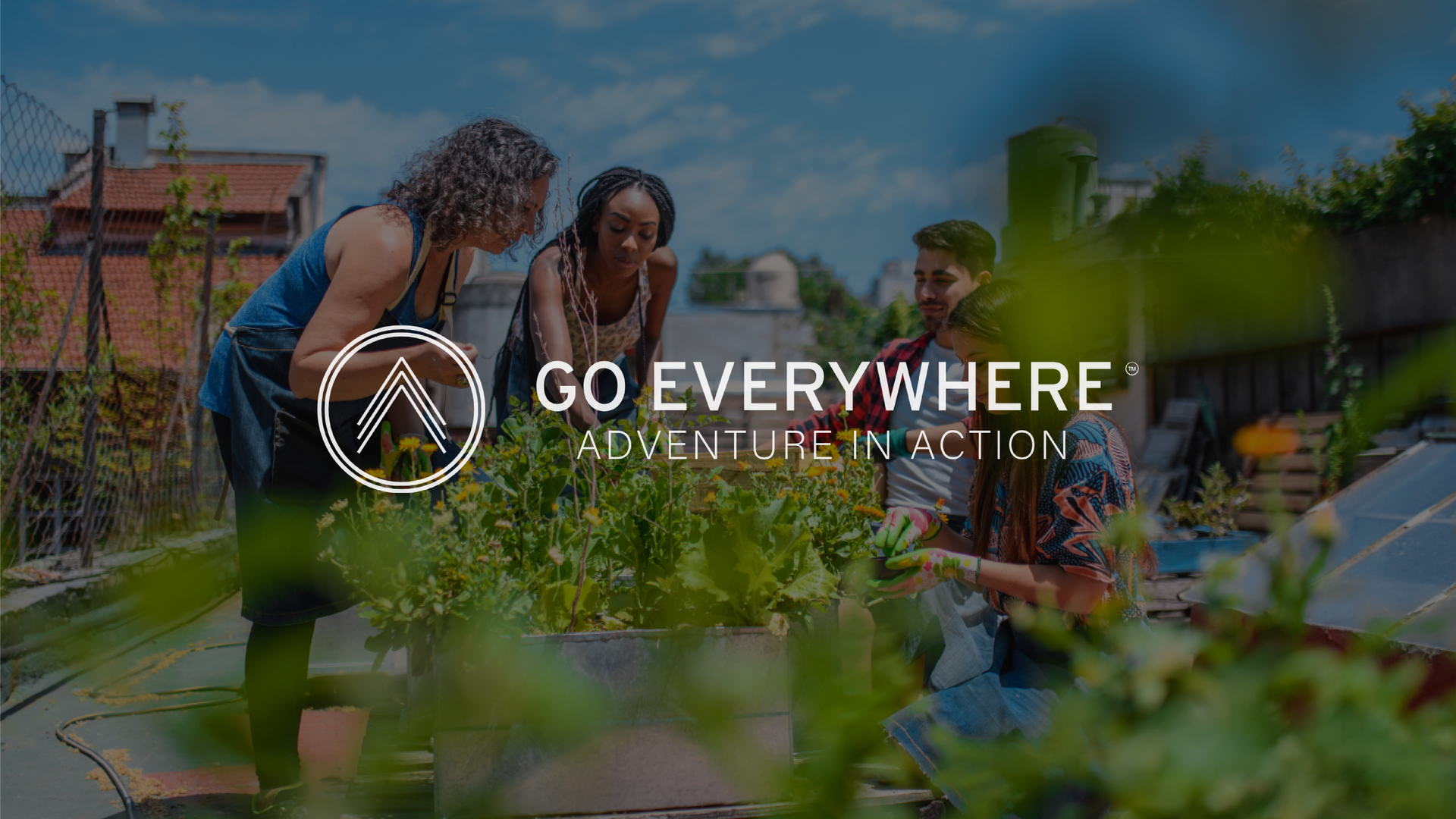 People gardening in a community plot with the text “GO EVERYWHERE” overlaid.