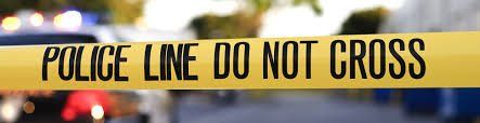 Crime Scene Cleanupi a close up of a police line that says `` police line do not cross '' .