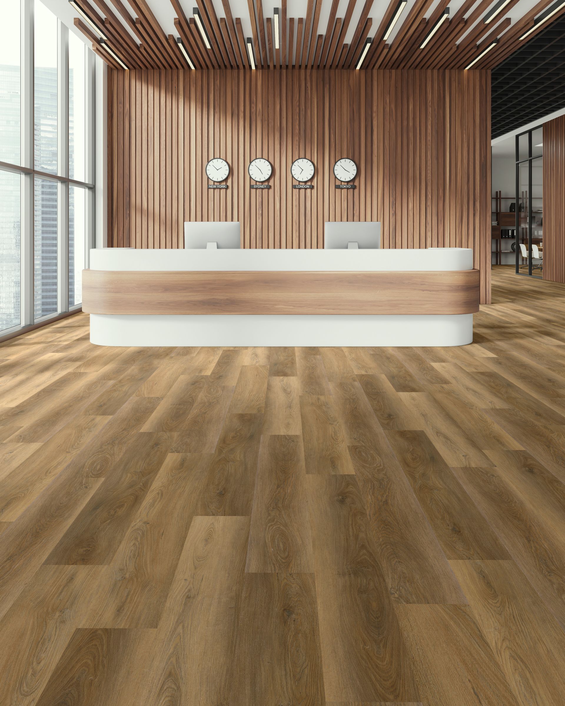 Modern office lobby with wooden floor, curved reception desk, and wall clocks on a wood-paneled wall