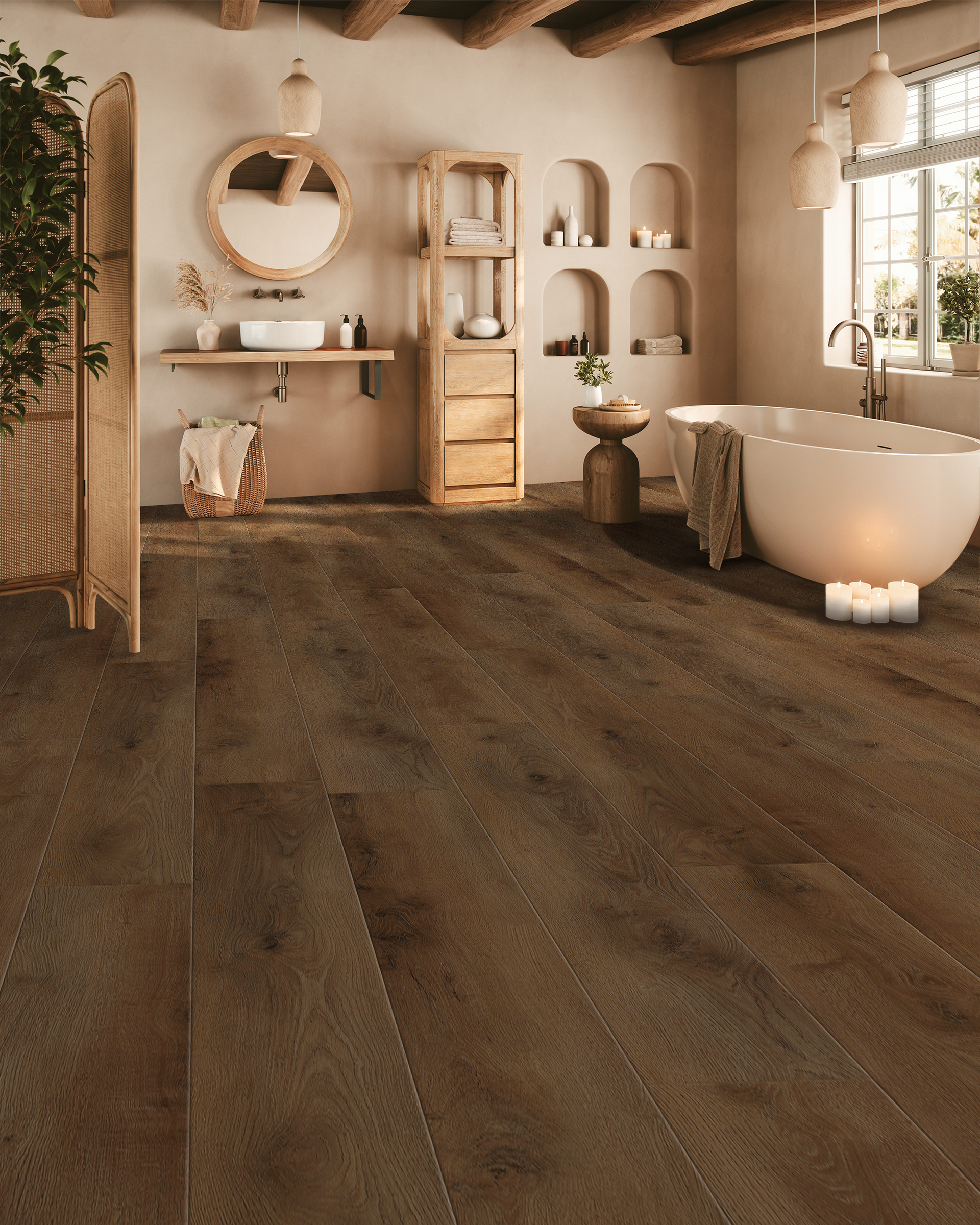 Cozy spa bathroom with wood floors, round mirror, arched shelves, and a freestanding tub by a window.