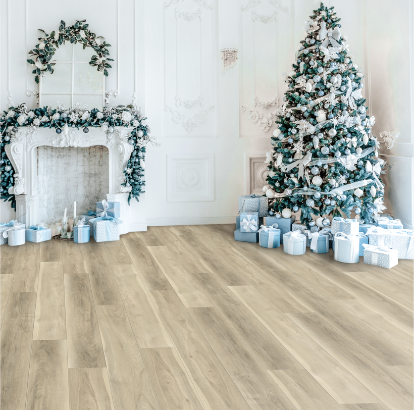 Elegant holiday room with decorated Christmas tree, fireplace garland, and wrapped gifts on a light wood floor