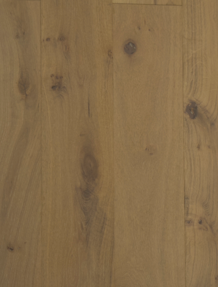 Close-up of light brown wood plank surface with visible knots and grain